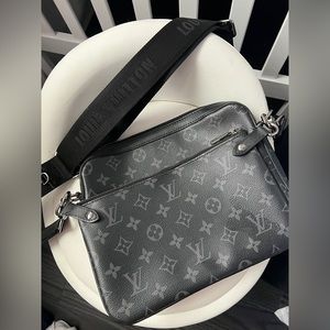 Louis Vuitton trio messenger bag.